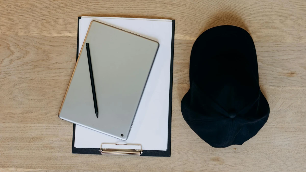 Graphic designer creating custom paper bag branding and print design specifications