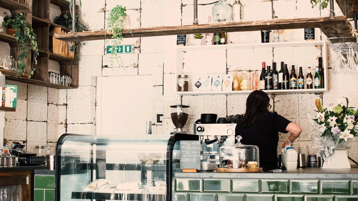Papacko café counter with transparent cups filled with colorful cold beverages and fruit teas arranged for s