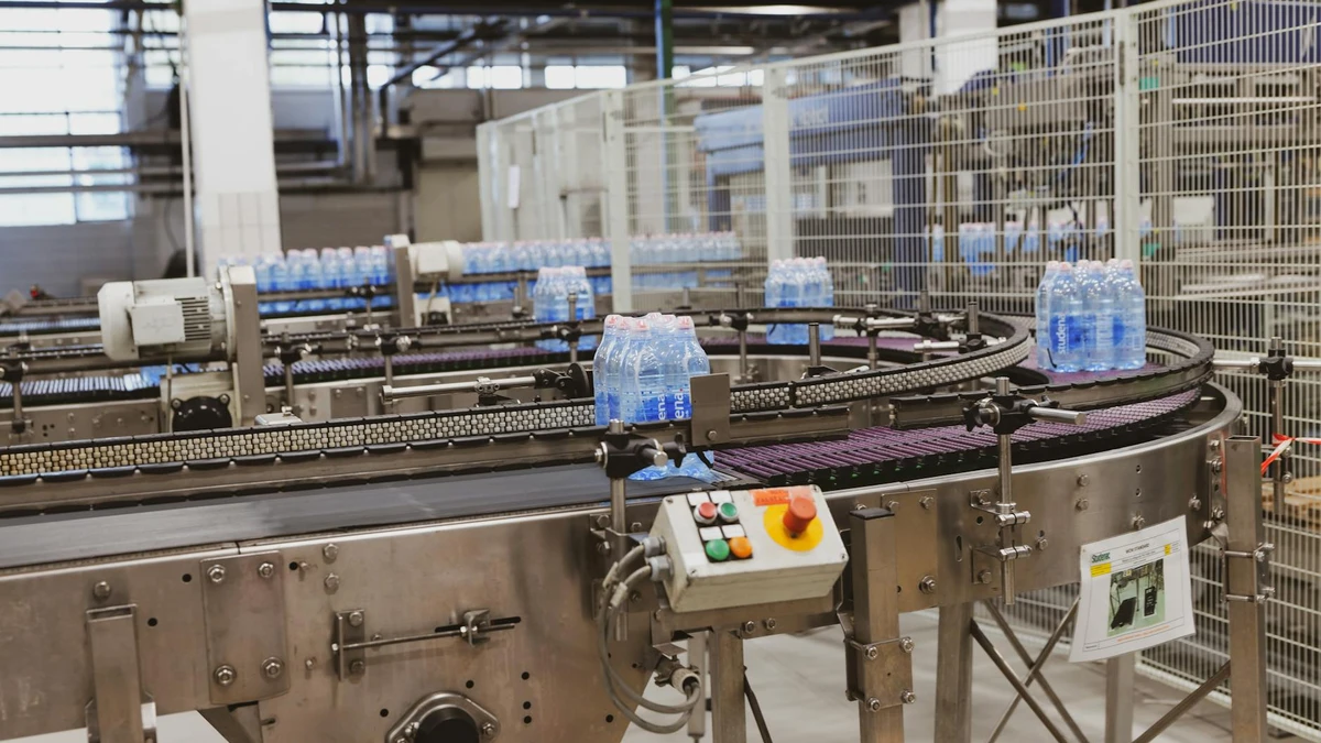 Papacko solar panels installed on industrial manufacturing facility roof with sustainable packaging producti