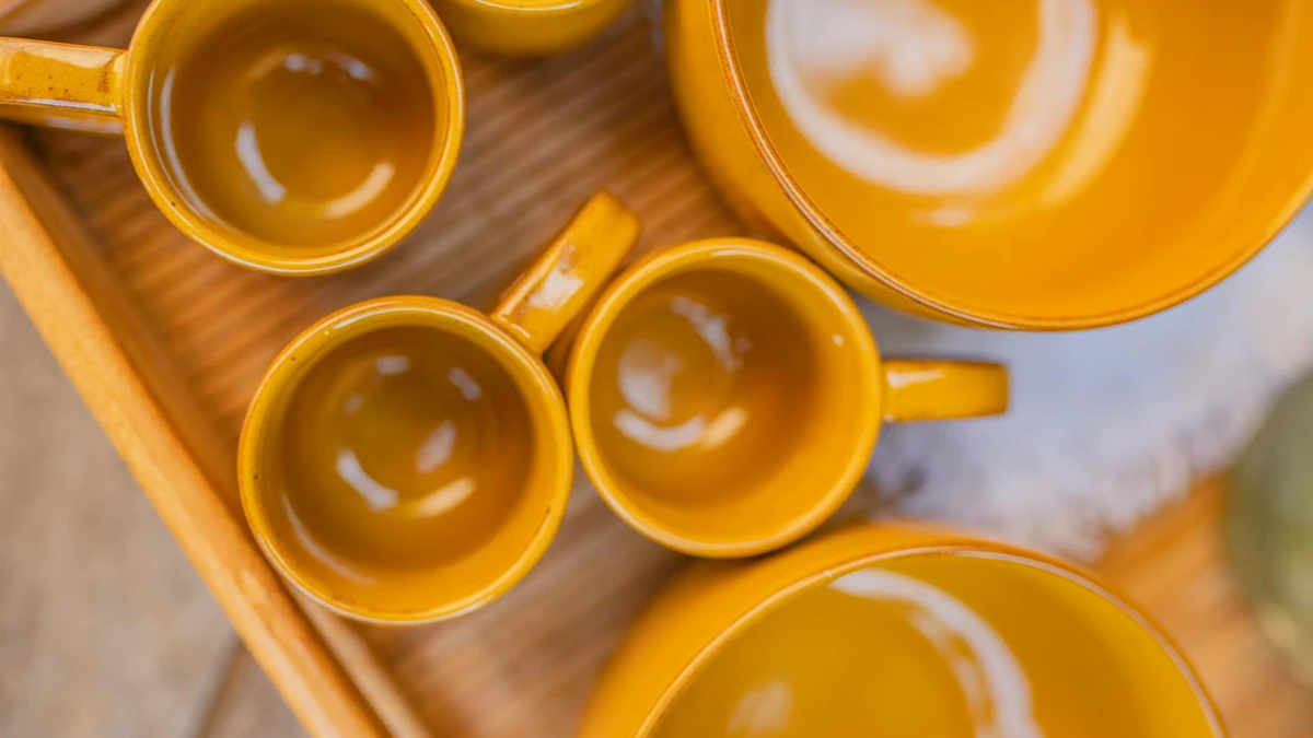 Sustainable cafe serving cold drinks in compostable cups to eco-conscious customers