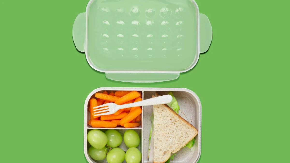 Papacko meal prep containers with healthy salads arranged in refrigerator showing portion control