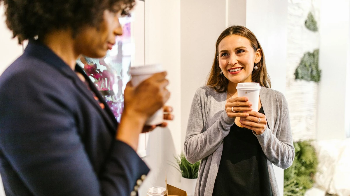 Papacko modern coffee culture showing diverse urban consumers with takeaway cups in cosmopolitan setting