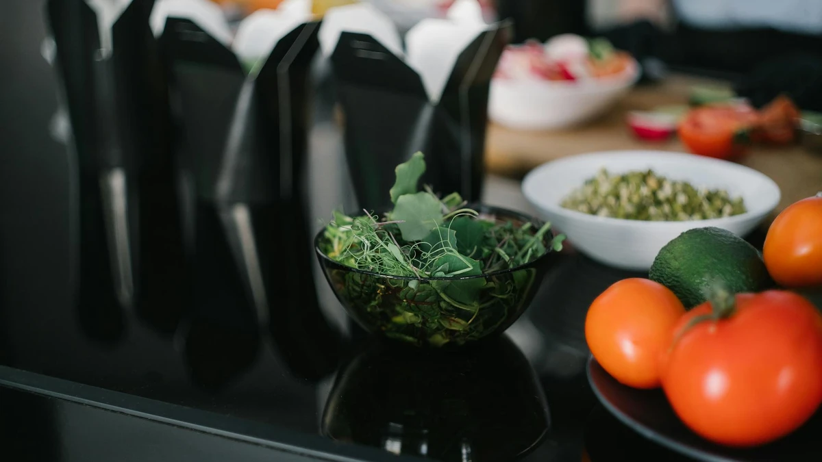 Papacko restaurant salad bar with variety of healthy ingredients in eco-friendly serving bowls