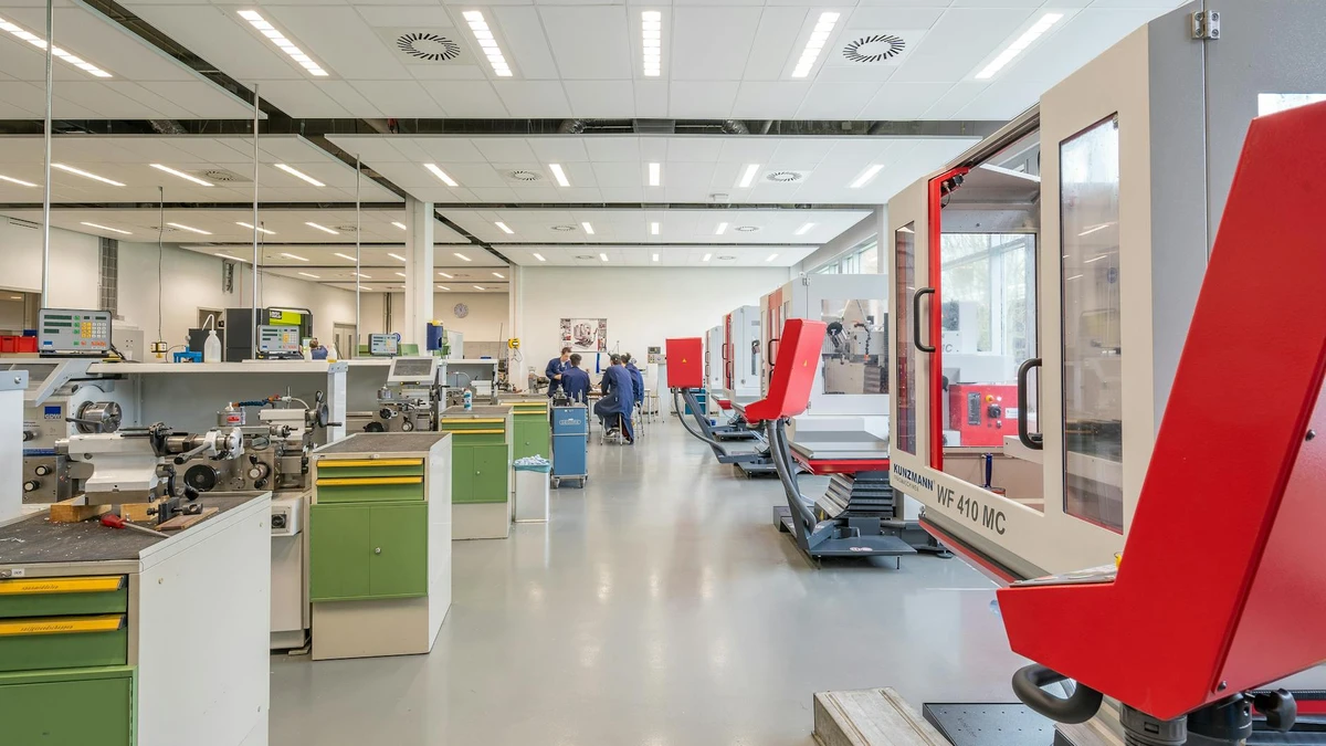 Papacko solar panels on modern factory roof with sustainable manufacturing facility