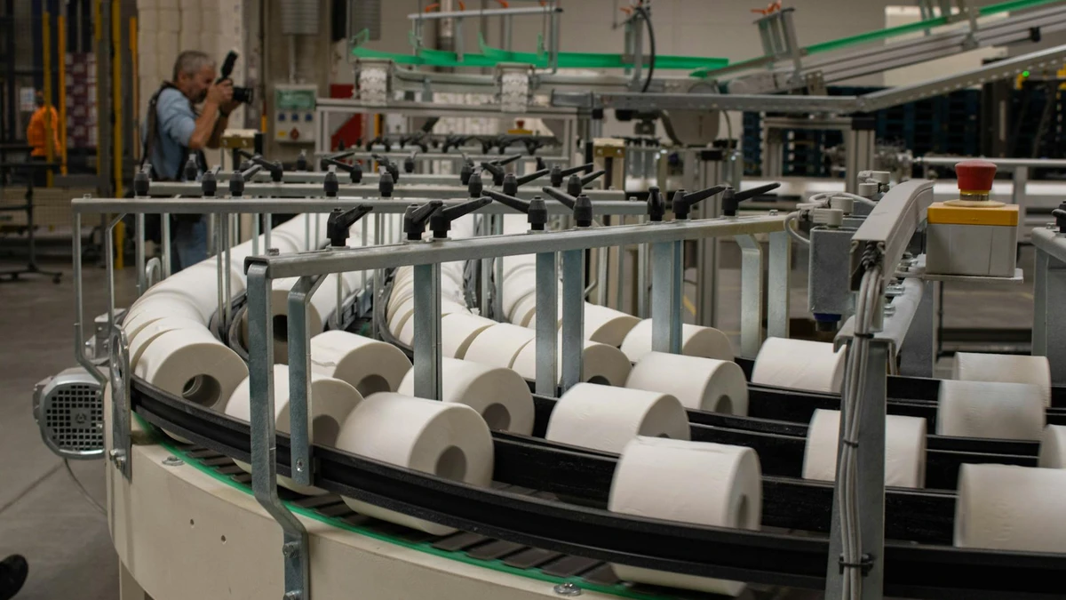 Papacko modern commercial composting facility with industrial equipment processing compostable packaging mat