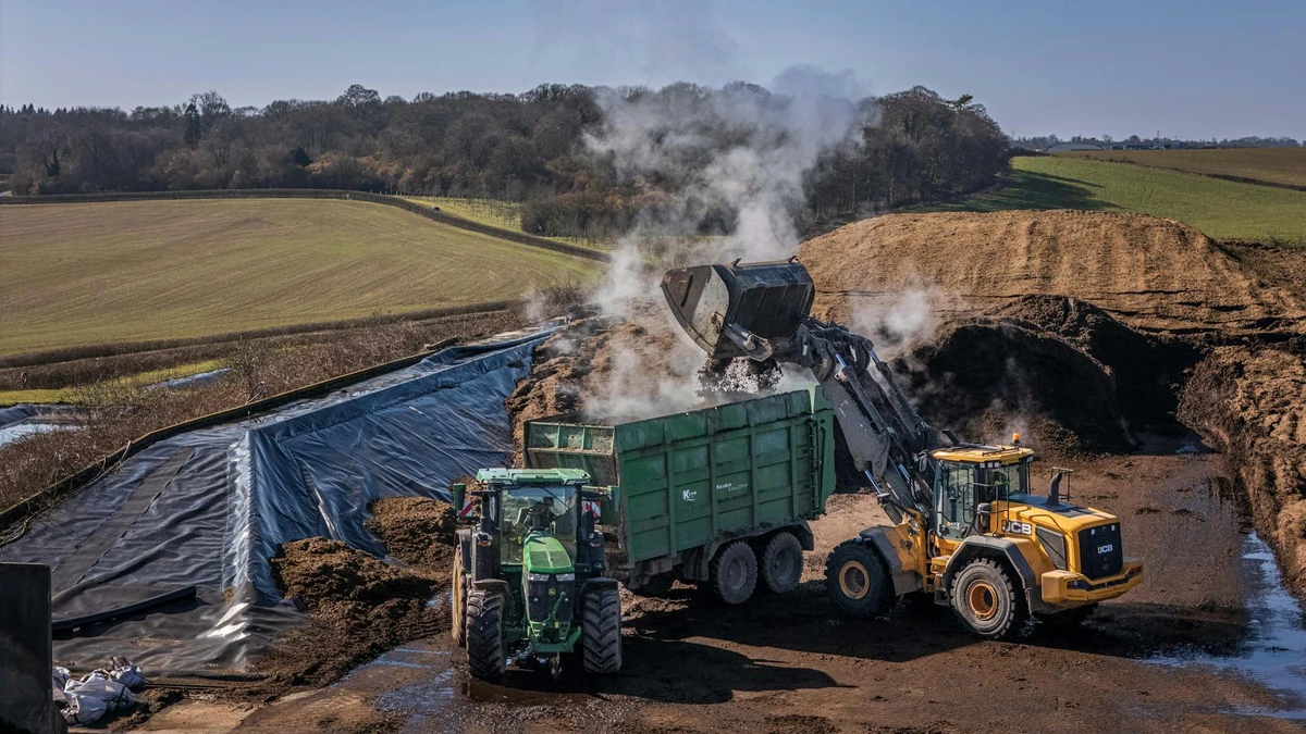 Papacko industrial composting facility showing biodegradable food trays breaking down in compost piles demon