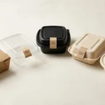 Five types of restaurant to go boxes arranged on a light surface showing material variety