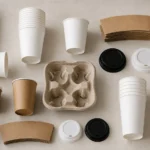 Empty unbranded coffee cup components arranged for material system review