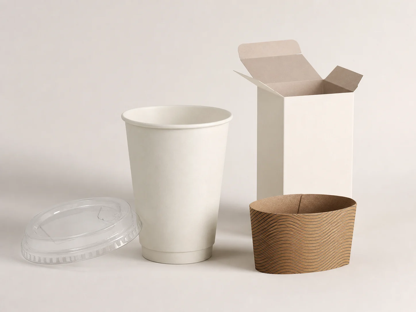 Paper cup lid coating and printed carton assessed as multi-material packaging