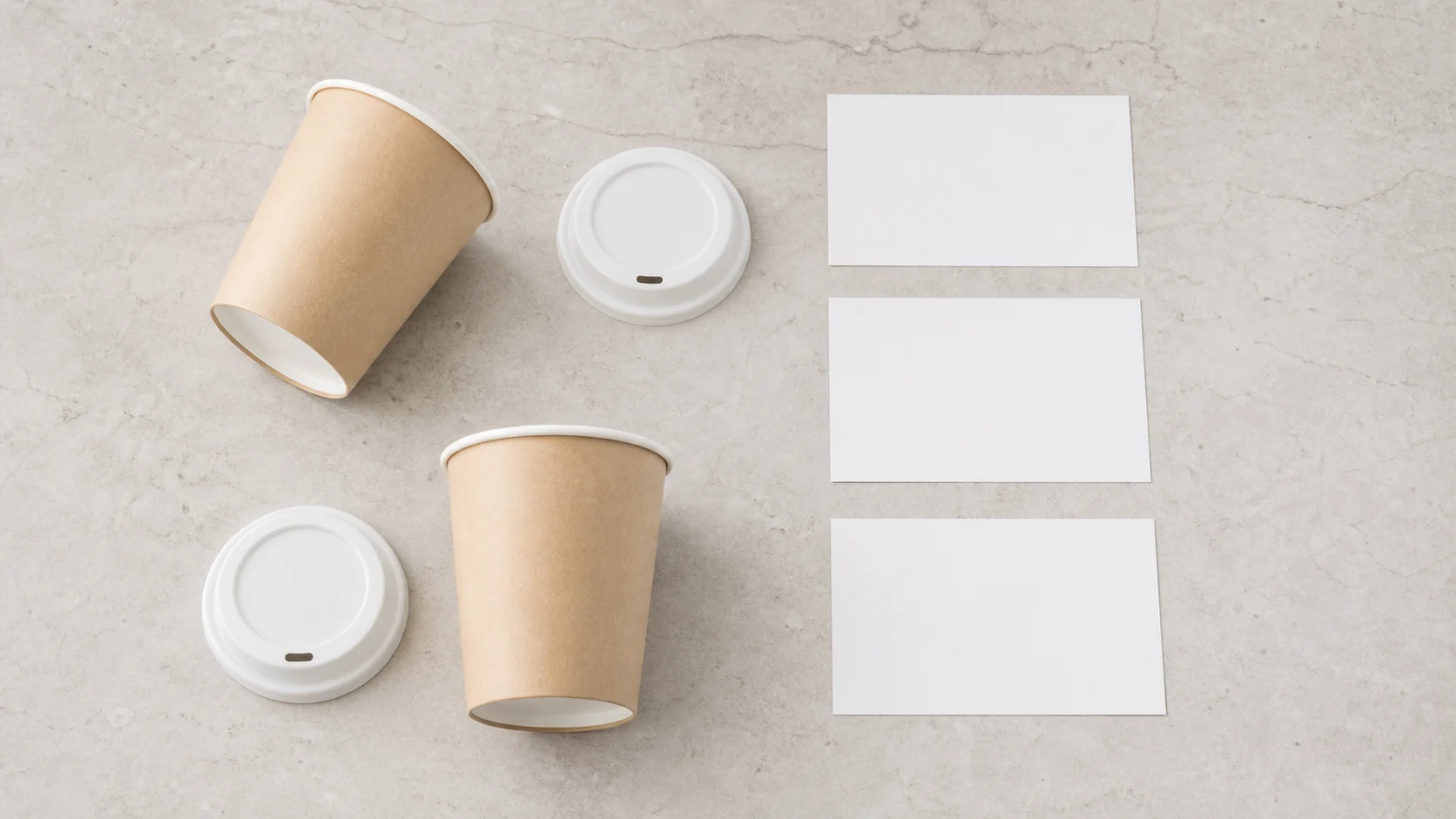 Empty paper cup sample family beside blank review cards