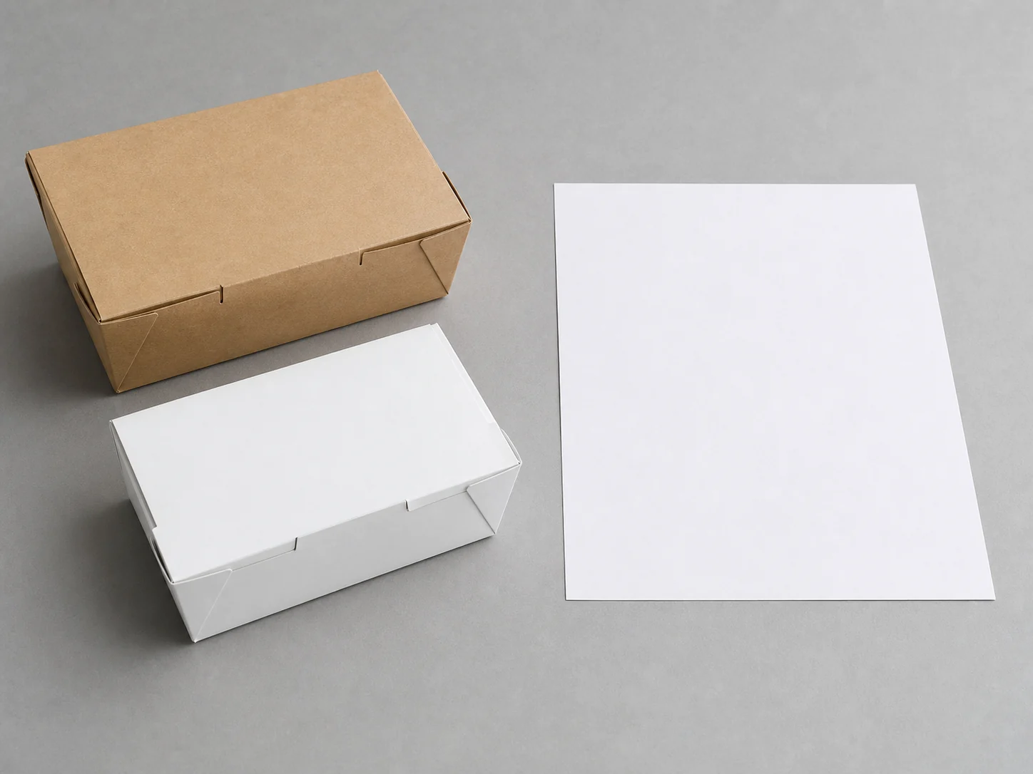 Plain paper food box samples beside a blank record sheet