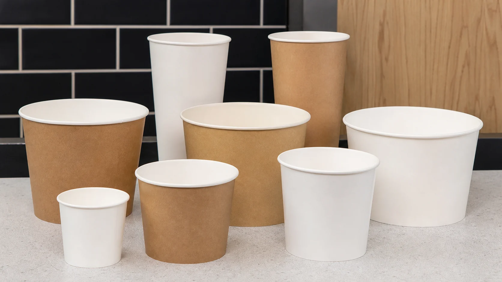 Empty unbranded popcorn buckets in generic cinema service formats
