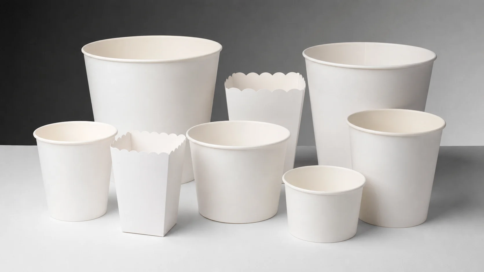 Empty unbranded popcorn buckets arranged for cinema packaging review